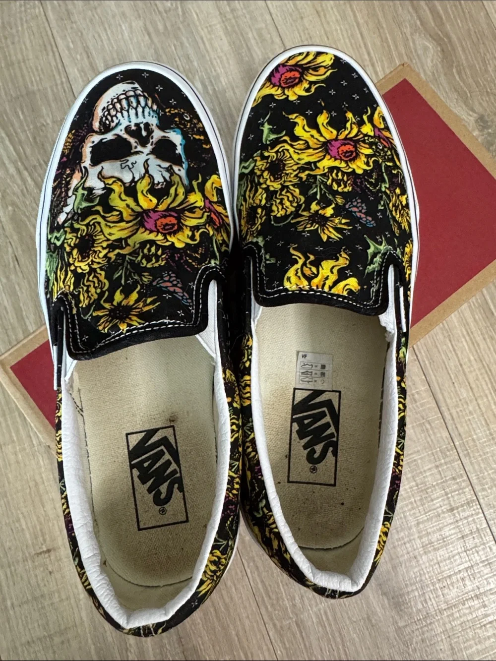 Vans Black Slip-On Loafers with Yellow Floral Skull Graphic